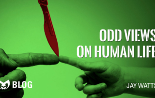 Odd views on human life. An image of a Childs finger touching a male adults finger.